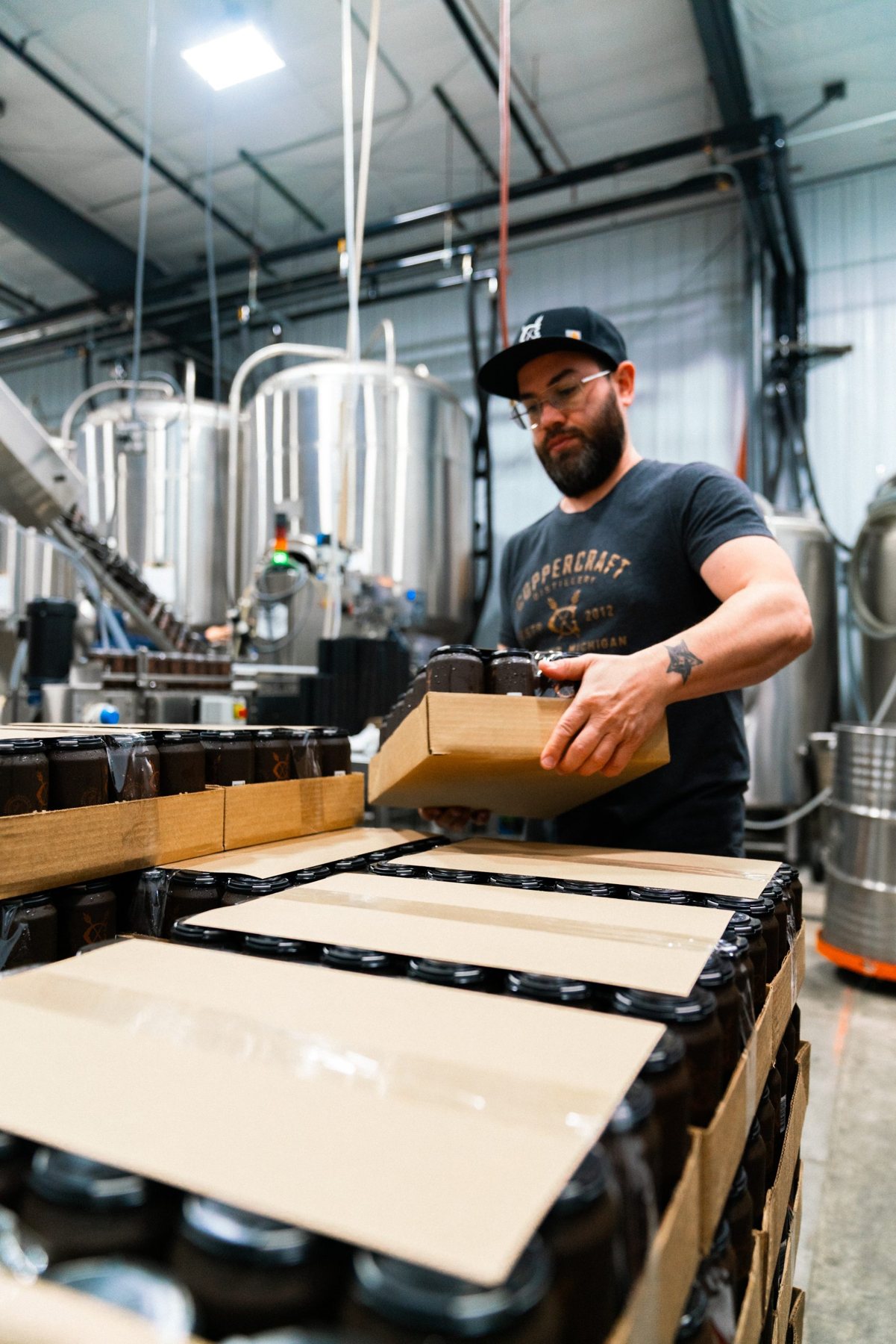 Craft Co. production team packaging beverages in Holland, Michigan